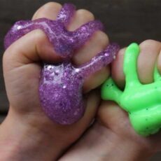 Purple slime with sparkles being squished