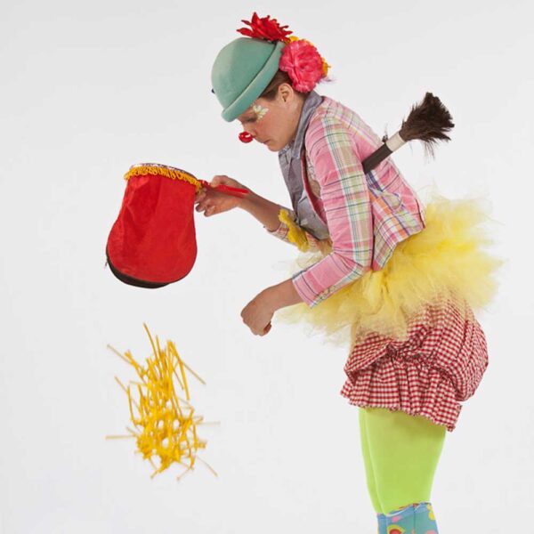 magician clown with red bag