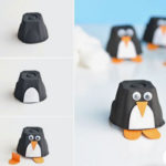 Pingouins avec boîtes d'oeufs