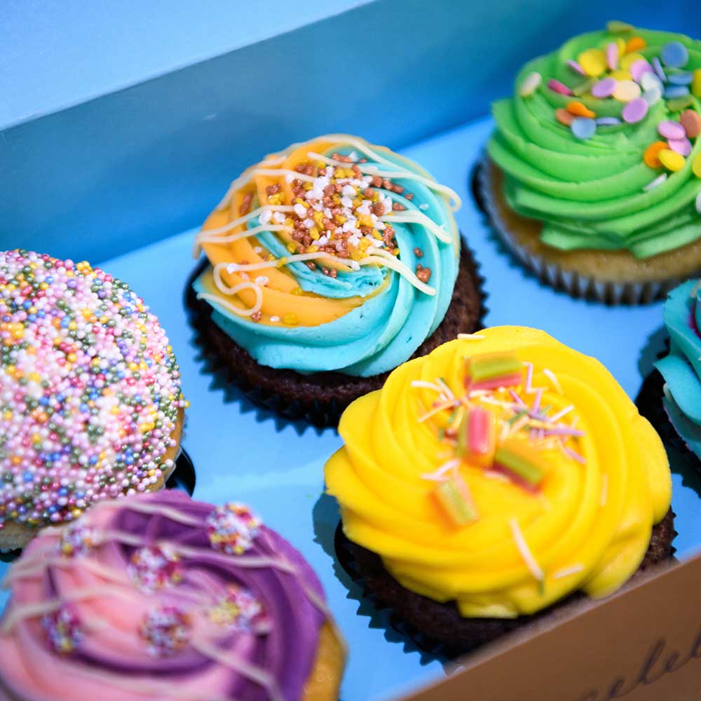 colorful cupcakes in a box
